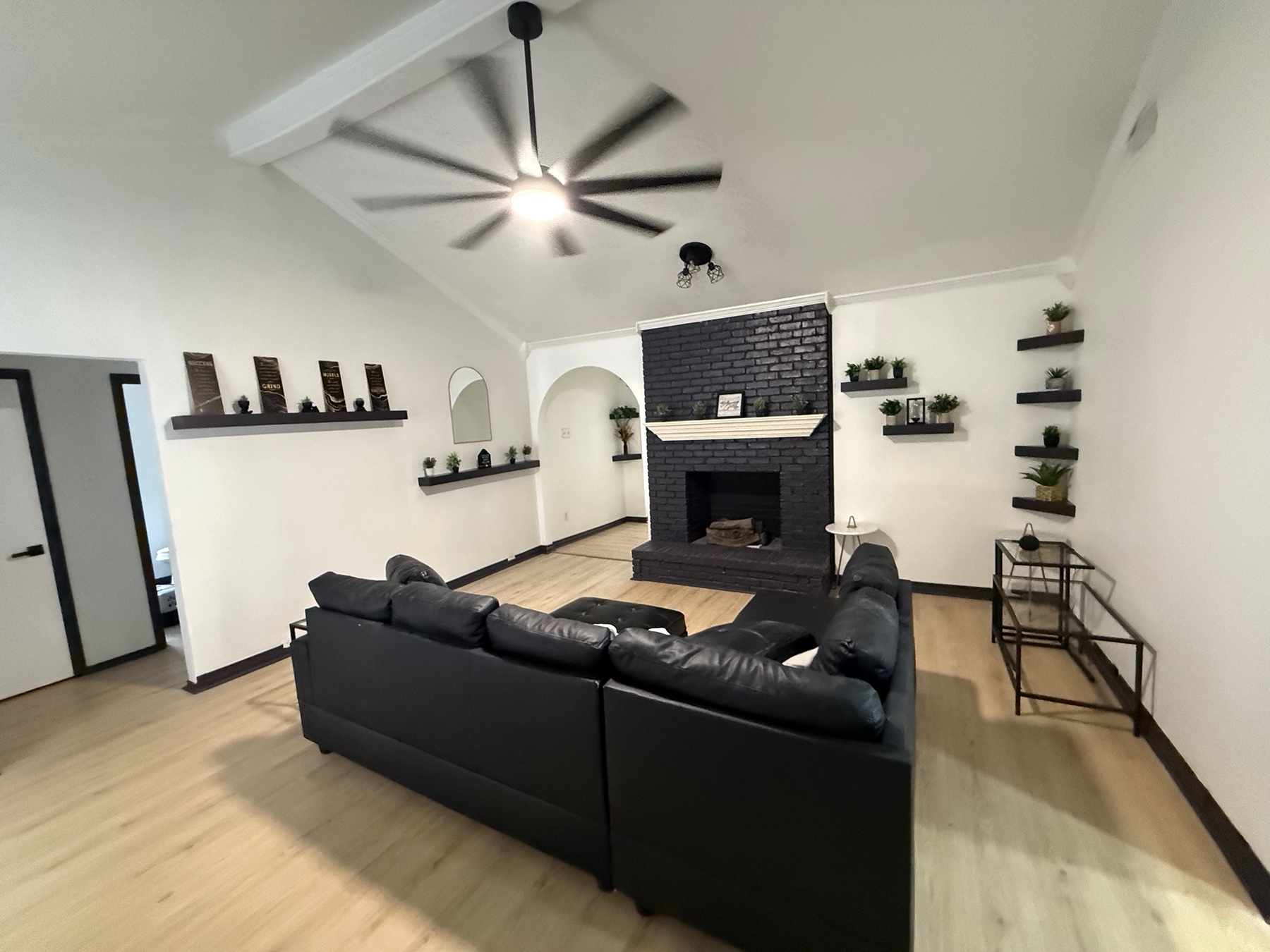 Meadowside living room with custom arches and dark trim